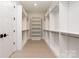 Large walk-in closet with ample hanging and shelving space at 1325 Ballard Dr, Waxhaw, NC 28173