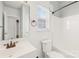 Bright bathroom featuring a white vanity, toilet, and bathtub at 136 Kristens Court Dr, Mooresville, NC 28115