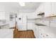 White kitchen with stainless steel appliances at 136 Kristens Court Dr, Mooresville, NC 28115