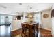 Dining area with wood table and chairs, kitchen view at 1964 Clear Brooke Dr, Kannapolis, NC 28083