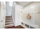 Entryway with staircase, bench, and coat hooks at 1964 Clear Brooke Dr, Kannapolis, NC 28083