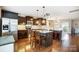 Modern kitchen with dark cabinets, stainless steel appliances, and island at 1964 Clear Brooke Dr, Kannapolis, NC 28083