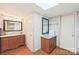 Basement bathroom with granite vanity and updated fixtures at 206 N Trexler Ave, Rockwell, NC 28138