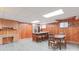 Finished basement kitchen with granite counters and wooden cabinets at 206 N Trexler Ave, Rockwell, NC 28138