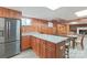 Basement kitchen with granite island and breakfast bar seating at 206 N Trexler Ave, Rockwell, NC 28138