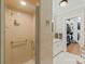 Bathroom with shower stall and built-in shelving at 206 N Trexler Ave, Rockwell, NC 28138