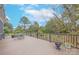 Deck with metal table and chairs, offering backyard views at 206 N Trexler Ave, Rockwell, NC 28138