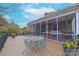 Spacious deck with seating area, overlooking a screened porch at 206 N Trexler Ave, Rockwell, NC 28138