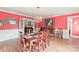 Formal dining room with hardwood floors, a chandelier, and red walls at 206 N Trexler Ave, Rockwell, NC 28138