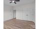 Bedroom featuring closet doors, luxury vinyl plank flooring and ample space at 2410 Brantley Rd, Kannapolis, NC 28083