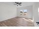 Bedroom featuring natural light, ceiling fan, and luxury vinyl plank flooring at 2410 Brantley Rd, Kannapolis, NC 28083