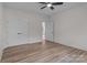 Bedroom featuring large closet and luxury vinyl plank flooring at 2410 Brantley Rd, Kannapolis, NC 28083