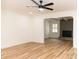 Spacious living room with hardwood floors and fireplace at 6372 Morehead Rd, Harrisburg, NC 28075