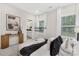 Well-lit bedroom with ensuite bathroom access and modern decor at 1000 Fairground St, Charlotte, NC 28208