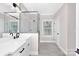 Spa-like bathroom with a walk-in shower and double vanity at 1002 Fairground St, Charlotte, NC 28208