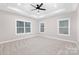 Bright bedroom featuring hardwood floors and ceiling fan at 1002 Fairground St, Charlotte, NC 28208