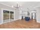 Bright kitchen with island, stainless steel appliances, and white cabinets at 1002 Fairground St, Charlotte, NC 28208