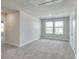 Spacious bedroom with carpeted floors and large windows at 105 Ciara Pl # A, Mooresville, NC 28117