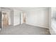 Spacious bedroom with grey carpet and access to bathroom at 105 Ciara Pl # B, Mooresville, NC 28117