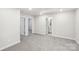 Bright bedroom with carpet flooring and two closets at 105 Ciara Pl # B, Mooresville, NC 28117