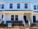 Two-story home with white siding and a welcoming front porch at 105 Ciara Pl # C, Mooresville, NC 28117