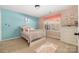 Bright bedroom with light carpeting and a full-size bed at 160 Hedgewood Dr, Mooresville, NC 28115