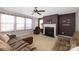 Living room with sectional sofa and fireplace at 160 Hedgewood Dr, Mooresville, NC 28115