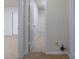 Open door reveals a tiled bathroom with shower at 4126 Kellybrook Dr, Concord, NC 28025