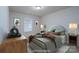 Virtually staged bedroom with a comfortable bed and stylish decor at 4126 Kellybrook Dr, Concord, NC 28025