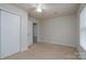 Bedroom with double door closet and window at 4126 Kellybrook Dr, Concord, NC 28025