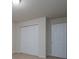 Bedroom with double-door closet and additional door at 4126 Kellybrook Dr, Concord, NC 28025