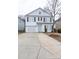 Two-story house with white siding, a driveway, and landscaping at 4126 Kellybrook Dr, Concord, NC 28025