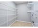 Laundry room with ample shelving for storage at 4126 Kellybrook Dr, Concord, NC 28025