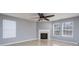 Bright living room featuring a fireplace and tile floors at 4126 Kellybrook Dr, Concord, NC 28025