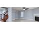 Spacious living room with fireplace and staircase at 4126 Kellybrook Dr, Concord, NC 28025