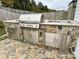 Stainless steel outdoor kitchen with granite countertops at 4126 Kellybrook Dr, Concord, NC 28025