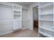 Spacious walk-in closet with shelving and drawers at 4126 Kellybrook Dr, Concord, NC 28025