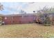 Brick house exterior with deck and yard at 8724 Old Plank Rd, Charlotte, NC 28216