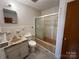 Clean bathroom with shower/tub combo and vanity at 925 Rock Grove Church Rd, Salisbury, NC 28146