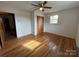 Bedroom with wood floors, ceiling fan and closet at 925 Rock Grove Church Rd, Salisbury, NC 28146