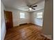 Bedroom with hardwood floors and a ceiling fan at 925 Rock Grove Church Rd, Salisbury, NC 28146