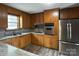 Kitchen with wood cabinets and stainless steel appliances at 925 Rock Grove Church Rd, Salisbury, NC 28146