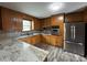 Updated kitchen with stainless steel appliances and granite countertops at 925 Rock Grove Church Rd, Salisbury, NC 28146