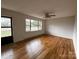 Living room with hardwood floors and large window at 925 Rock Grove Church Rd, Salisbury, NC 28146