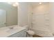Bright bathroom features a tub and shower combo and a large mirror over the vanity at 1150 Red River Dr, Salisbury, NC 28144