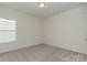Bedroom with neutral carpet, single window, and blank walls ready for decor at 1150 Red River Dr, Salisbury, NC 28144