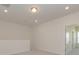 Bonus room has neutral carpet, recessed lighting, and access door at 1150 Red River Dr, Salisbury, NC 28144