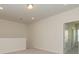 Loft area featuring neutral carpet, recessed lighting, and an open doorway at 1150 Red River Dr, Salisbury, NC 28144