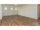Open floor plan featuring hardwood floors, natural light, and a doorway to another room at 1150 Red River Dr, Salisbury, NC 28144