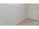 Walk-in closet with carpeted floor and wire shelving for ample storage at 1150 Red River Dr, Salisbury, NC 28144